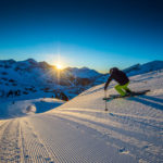 Wandbild Skifahren Sonnenaufgang