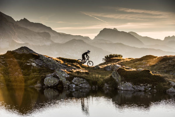 Wandbild Sonnenuntergang Mountainbike